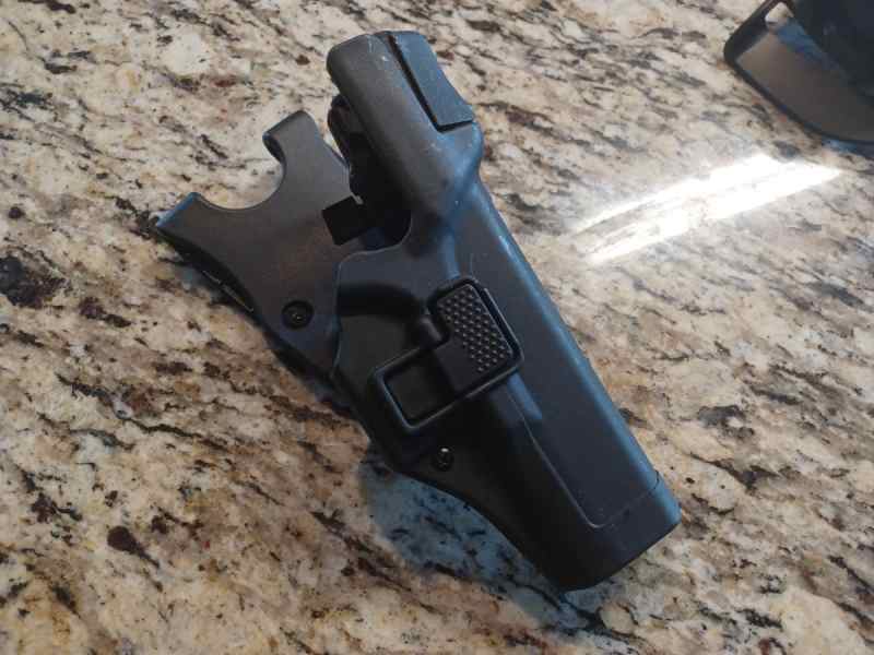 Two BlackHawk Glock 19/17/22 holsters