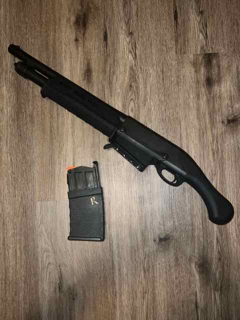 Discontinued Remington 870 DM w/ 12 GA 6 Round Mag