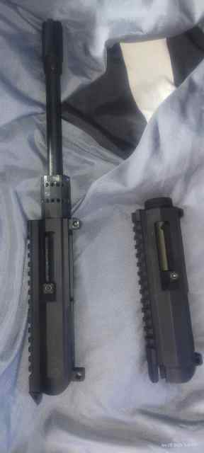 45acp upper with a used receiver and a new receive