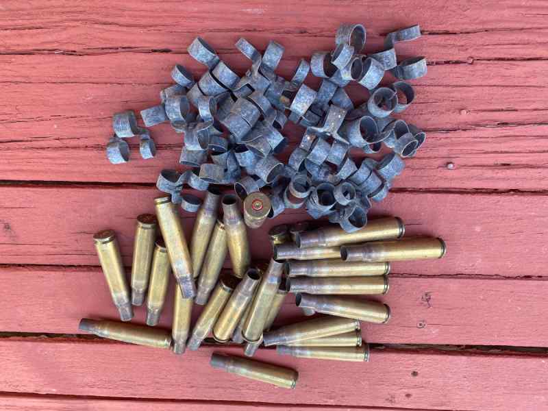 50 BMG Brass (25) and steel links