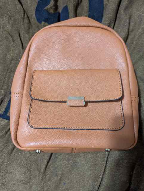 NEW Small tan leather back pack w/makeup bag