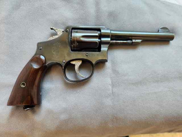  38 SMITH AND WESSON VICTORY REVOLVER