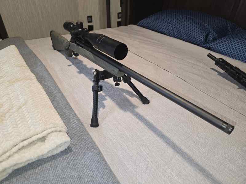 Savage 110 300 win mag trail hunter with vortex vi