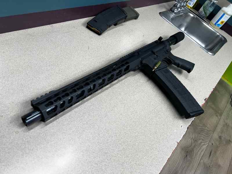 AR 15 pistol $660 42 round magazine