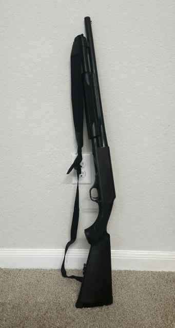 Pump action shotgun w/sling