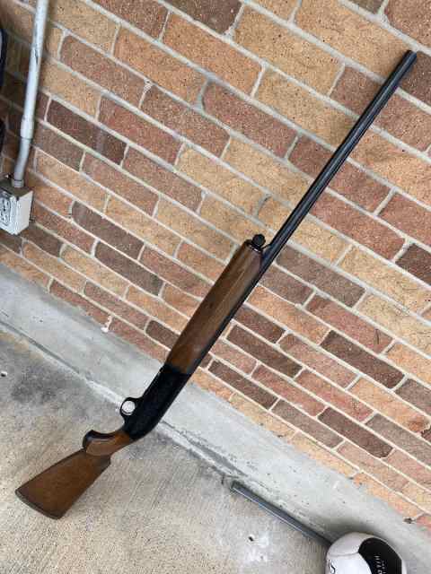 20 gauge engraved Beretta Semi-Auto shotgun