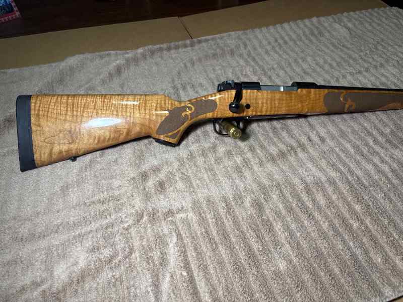 Winchester model 70 featherweight with AAAA Curley