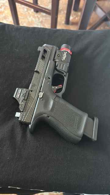 Ported Glock 19 gen5 with extras 