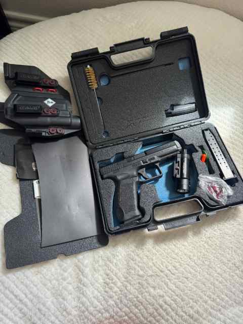 Canik TP9SF with holster/light