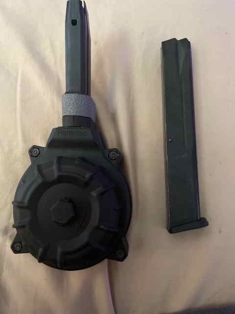 40 rd pro mag drum and extra extended magazine!
