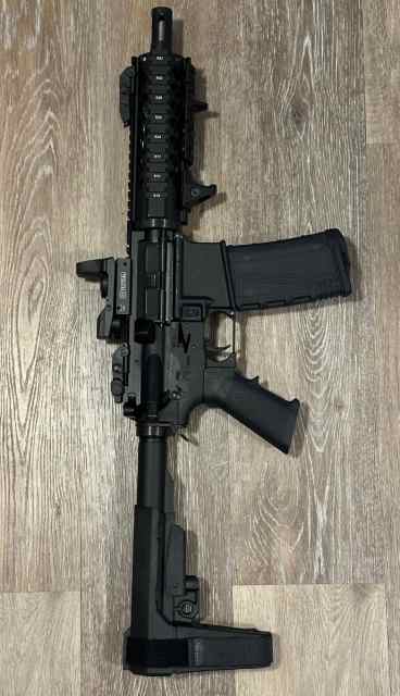 AR-15 PISTOL, SIG P320, AND GLOCK 21 SF.